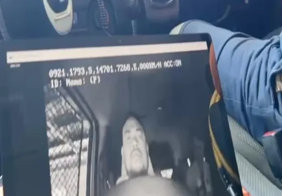 Infrared driver-monitoring camera view of a driver shown on a tablet